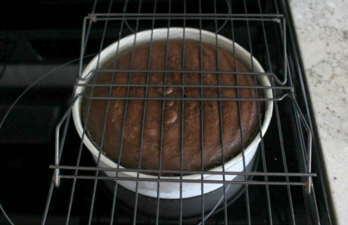 Turning out cakes onto racks