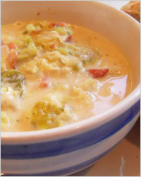 Суп с сыром, рисом и капустой