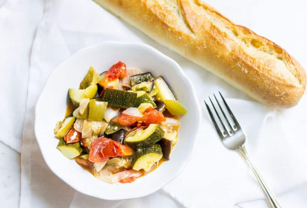 Easy Ratatouille: a French vegetable stew made with summer veggies. Super easy and perfect as a side or light entrée. Recipe via MonPetitFour.com